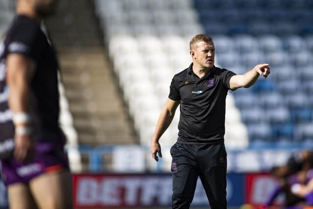 Former Wigan Warriors youngster Luke Robinson has been appointed interim coach at Huddersfield Giants