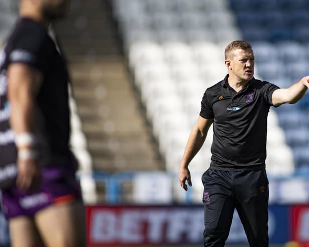 Former Wigan Warriors youngster Luke Robinson has been appointed interim coach at Huddersfield Giants