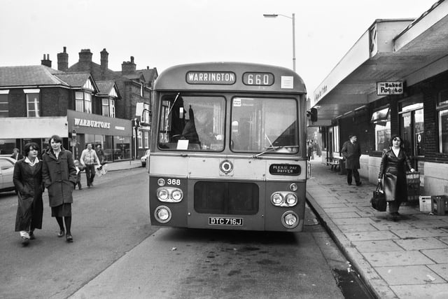 The Hope Street side of Wigan bus station in 1981 with Warburton's furniture store on the left and the Baked Potato cafe on the right.
