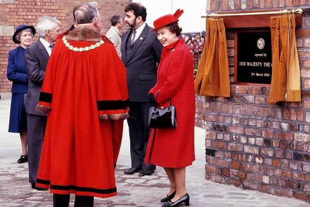 The Queen chats to the mayor of Wigan, Coun. George Lockett, after opening Wigan Pier on Friday 21st of March 1986.
