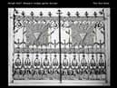 Gates with an eye design seen on the ceiling in Haigh Hall