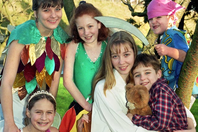 Characters from the Willpower Youth Theatre production of "Peter Pan" with Gina Beardsmore as Peter Pan, Jennifer Mort as Tinker Bell, Peter Collins as Michael, Kirsty McAllister as Wendy, Samantha Bailey as Street Fairy and Andrew Barclay as a pirate in January 1998.