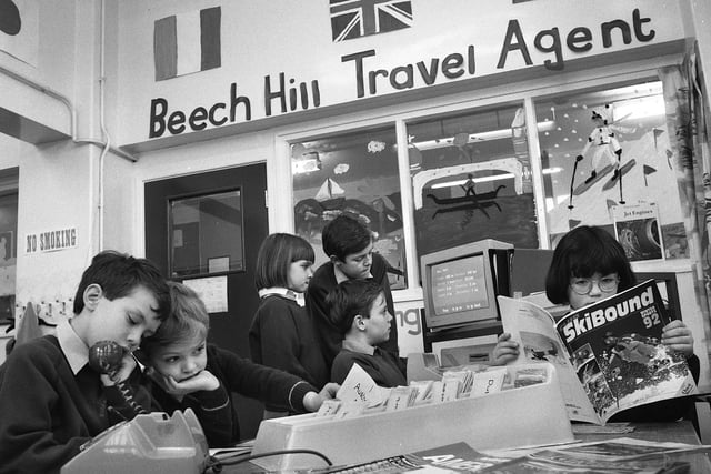 Pupils set up their own travel agency at Beech Hill Primary School on Tuesday 10th of March 1992.