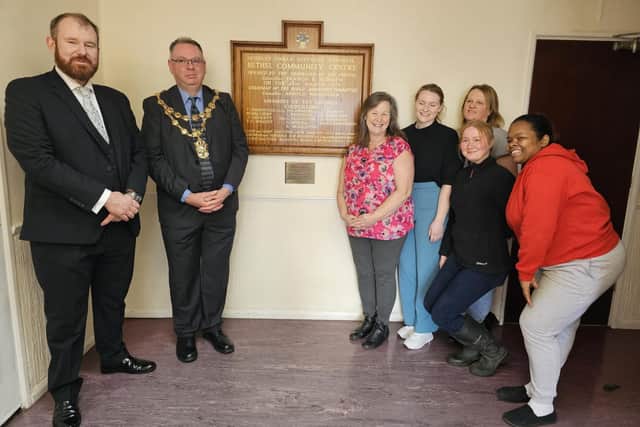 Hindley Green councillor James Palmer, left, and Mayor of Wigan Coun Kevin Anderson at the unveiling of a refurbished plaque at The Bethel Community Centre last month