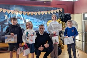 MP Josh Simons with the successful participants in his Christmas card competition