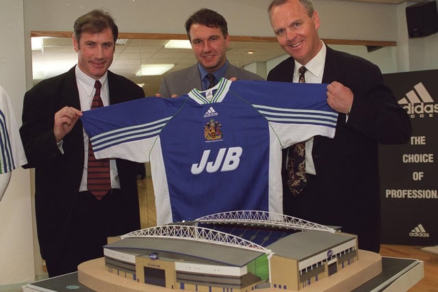 Official 'adidas'/ Wigan Athletic's new shirt sponsorship launch. Left to right is Clive Evans 'adidas' Nationwide Commercial Manager, Duncan Sharpe  managing director of JJB sports and John Deehan manager of Wigan Athletic.