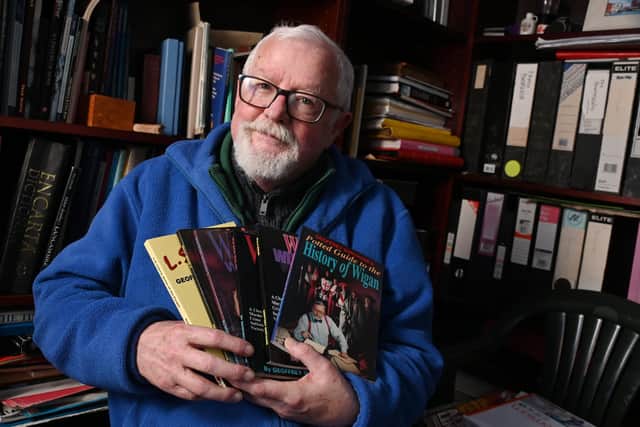 Geoff Shryhane, with some of the books he has written, announced his retirement as a columnist in the Wigan Observer after decades of service to the paper as a journalist