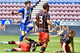 Chris Sze came close to giving Latics an early lead after great work from Dion Rankine