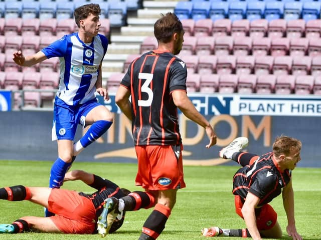 Chris Sze came close to giving Latics an early lead after great work from Dion Rankine
