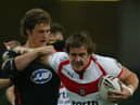 Bryn Hargreaves in action for St Helens against his hometown club Wigan