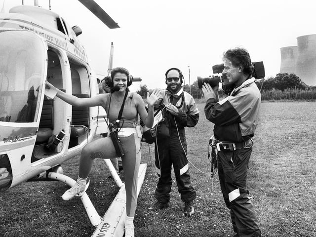 Annabel Croft emerges from a helicopter in Poolstock during filming for Channel Four television's "Treasure Hunt" on Tuesday 19th of July 1988.