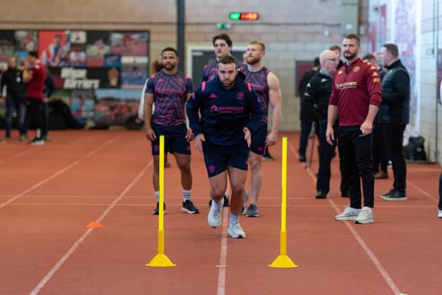 Wigan Warriors players are put through their paces at the media day