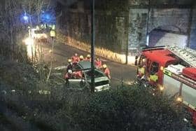 Emergency workers at the crash scene on Walthew Lane, Platt Bridge