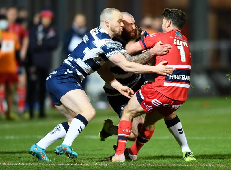 Jake Bibby and Liam Marshall tackle Lachlan Coote.