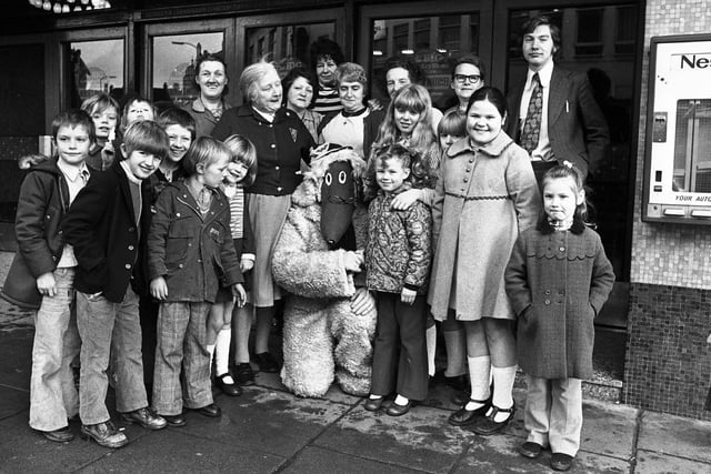 RETRO 1974 Members of Wigan ABC Cinema Minors Club gather around a visiting Womble