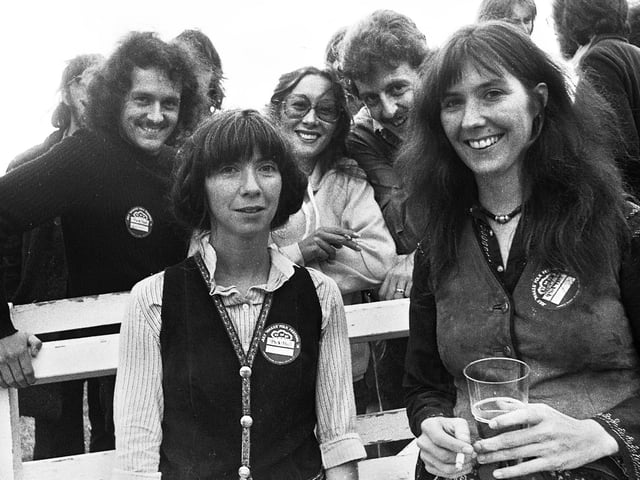 Canadian singers Anna, left, and Kate McGarrigle with fans at the July Wakes Folk Festival at Park Hall, Charnock Richard, on Saturday 24th of July 1976.