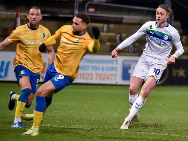 Thelo Aasgaard wheels away after scoring Latics' second goal at Mansfield in midweek
