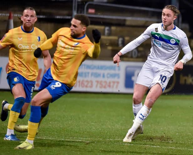 Thelo Aasgaard wheels away after scoring Latics' second goal at Mansfield in midweek