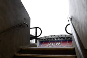 Wigan Athletic play their home games at the DW Stadium.