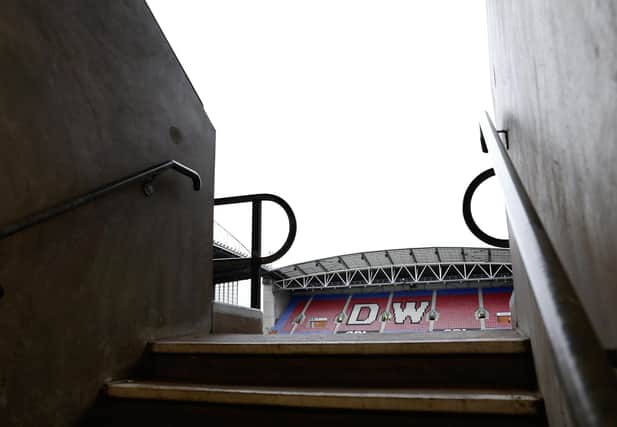 Wigan Athletic play their home games at the DW Stadium.