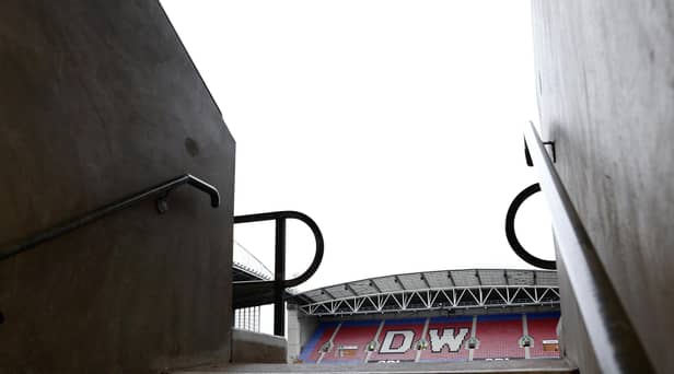 Wigan Athletic play their home games at the DW Stadium.