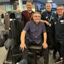 Coun Chris Ready (seated) with, left to right: Be Well’s health and fitness development manager Paul Just, Wigan Life Centre assistant manager Rob Parkinson and instructors Alan Miller and Heather McAllister who have both completed a Level 3 Diploma in Exercise Referral with HFE
