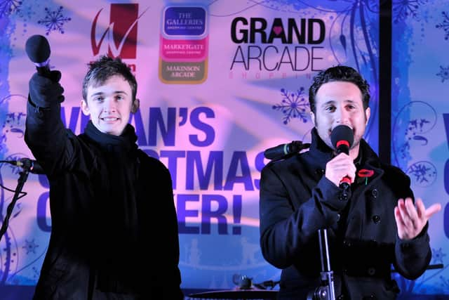 Luke Marsden and Anthony Costa on stage at the Wigan Christmas lights switch-on in 2010