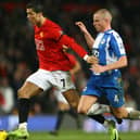 Lee Cattermole in action for Latics against Manchester United