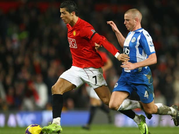 Lee Cattermole in action for Latics against Manchester United