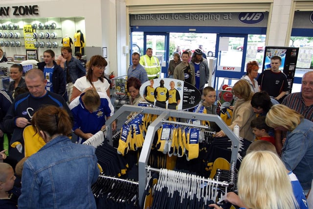 Premiership Wigan Athletic launched their new AWAY yellow kit at The JJB Store in Robin Park. Fans flock to get their new kit and autographs.