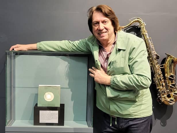 Northern Soul expert Tim Brown with the rare single which has gone on display at the Museum of Wigan Life