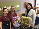 Karen Cox, manager of Spinning Gate shopping centre, with Maz Fossett and Vicky Falcon, from Costa
