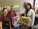 Karen Cox, manager of Spinning Gate shopping centre, with Maz Fossett and Vicky Falcon, from Costa