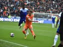 Skipper Tendayi Darikwa gets stuck in against Blackpool