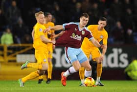 Burnley's Sam Vokes vies for possession with Preston North End's Tom Clarke

Photographer Chris Vaughan/CameraSport

Football - The Football League Sky Bet Championship - Burnley v Preston North End - Saturday 5th December 2015 - Turf Moor - Burnley

© CameraSport - 43 Linden Ave. Countesthorpe. Leicester. England. LE8 5PG - Tel: +44 (0) 116 277 4147 - admin@camerasport.com - www.camerasport.com