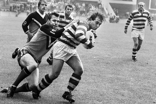 Wigan hooker Nicky Kiss forces his way over for a try against Whitehaven at Central Park in a league match on Sunday 30th of August 1981.
Wigan won 25-8.