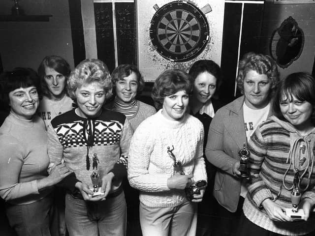 The womens darts team at The Old Pear Tree pub in Wigan, 1978
