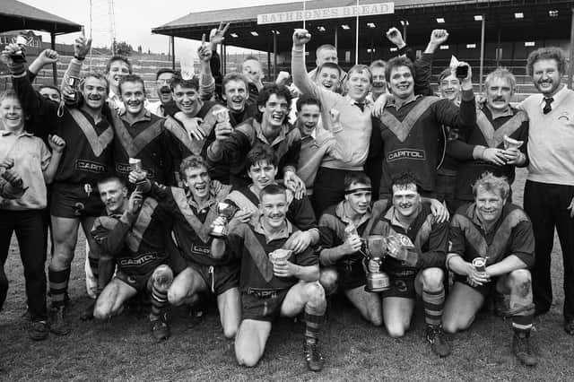 Crown Springs celebrate after beating Ince Rose Bridge 26-22 in the final of the Ken Gee Cup on Sunday 29th of May 1988 at Central Park.
