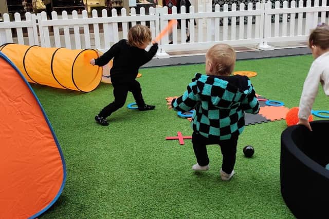 Children enjoy the Halloween-themed play area at Spinning Gate shopping centre