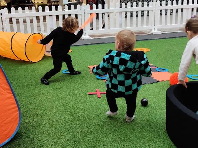 Children enjoy the Halloween-themed play area at Spinning Gate shopping centre