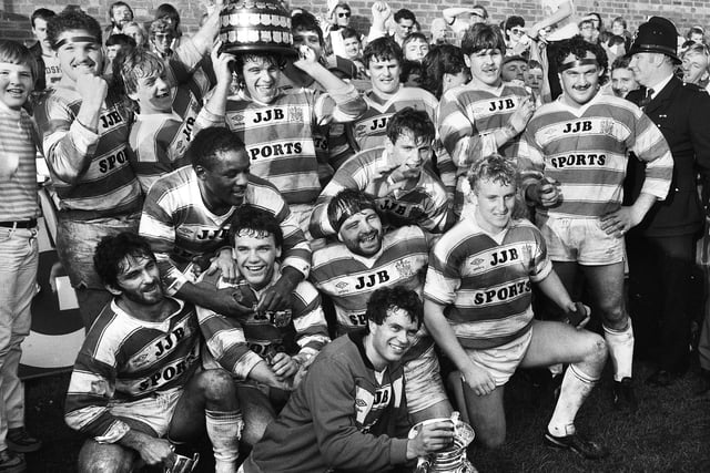 Wigan celebrate after beating Warrington 34-8 in the Lancashire Cup Final at Knowsley Road on Sunday 13th of October 1985.
