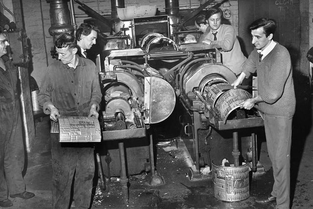 Plate setters shaping the metal pages to clamp to the presses at the Post and Chronicle newspaper at Brock Mill in Leyland Mill Lane in 1971.