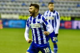 Jonny Smith scored his first goal for the club in the 2-0 EFL Trophy victory