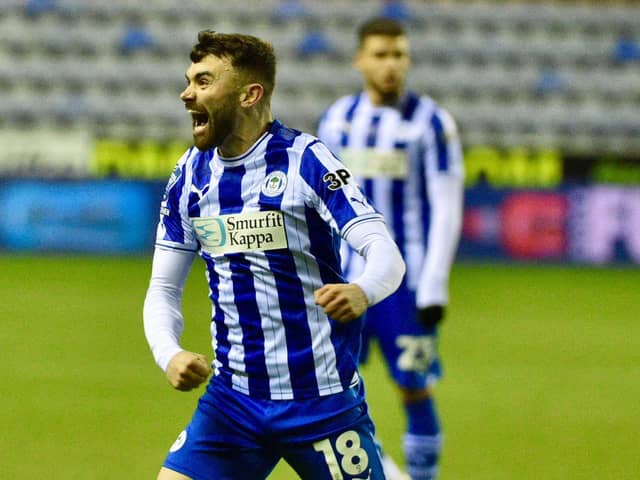 Jonny Smith scored his first goal for the club in the 2-0 EFL Trophy victory