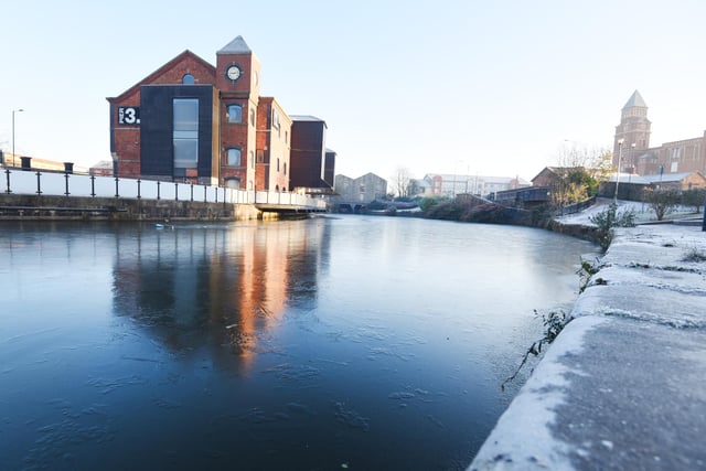 Emergency services are warning members of the public about the dangers of frozen water and not to stand on the ice.  Sections of the Leeds Liverpool canal are frozen over at Wigan Pier.