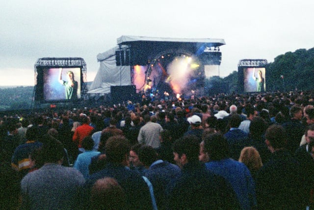 Richard Ashcroft on the big screen with the stage in front of a packed Haigh Hall
