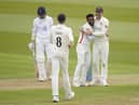 Jimmy Anderson (right) celebrates a wicket with Hassan Ali (Andrew Matthews PA Wire)