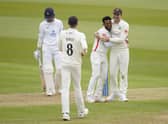 Jimmy Anderson (right) celebrates a wicket with Hassan Ali (Andrew Matthews PA Wire)