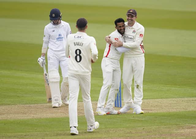 Jimmy Anderson (right) celebrates a wicket with Hassan Ali (Andrew Matthews PA Wire)