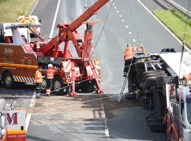 A large amount of diesel and oil spilled onto the carriageway which needed to be cleared before the road surface could be inspected for damage